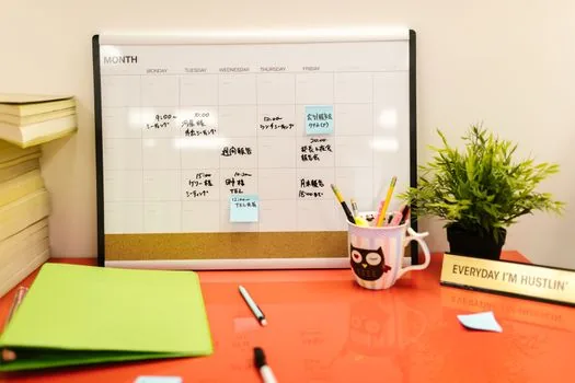 apartment management office consultation desk with resident notes and calendar, realistic Korean editorial photography