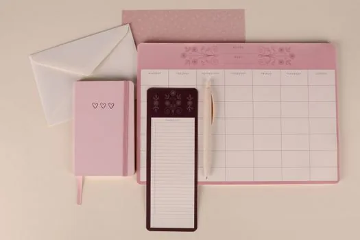 close up of CSAT application receipt checklist, calendar marked September 4, pen and documents on bright desk, editorial education photo, no real logos | 수능 원서접수 접수증 확인 이미지