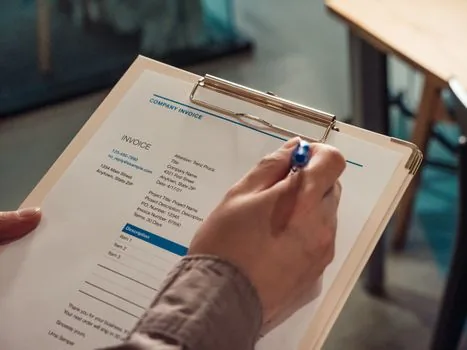 close up of Korean gas bill, customer number area highlighted with pen and memo, no readable personal data, realistic photo | 고객식별번호와 계약자명을 고지서에서 대조하는 장면