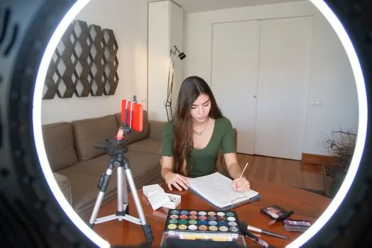Korean creator filming a personal vlog at a desk with rain on window, no readable brand logos | 백진희 지니이즈백 영상 발언 맥락 | 유튜브 브이로그 발언 설명용 이미지