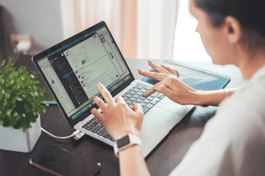 Korean renter searching apartment address on Internet Registry Office style laptop screen, lease contract and address memo nearby, no readable personal data | 인터넷등기소에서 부동산 주소를 검색하는 장면