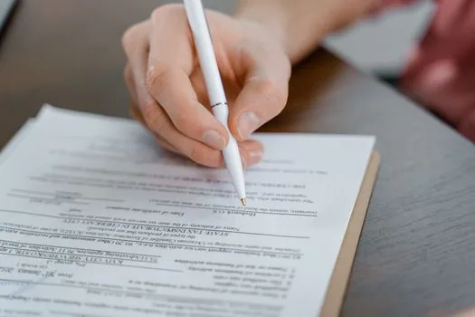Seoul land transaction permit documents with apartment contract checklist and calendar, realistic newsroom photo