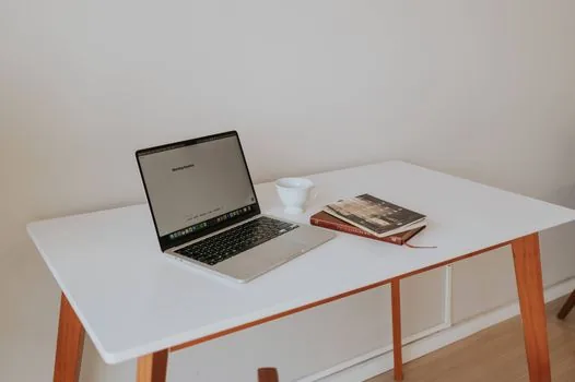 Korean applicant organizing apartment subscription result date, saved PDF notice, application confirmation on laptop, clean realistic desk | 청약 신청내역과 발표일 자료를 정리하는 장면
