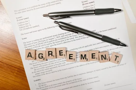 lease contract scan preparation, laptop with court registry style page, stamp date memo, folder labeled fixed date, realistic document desk