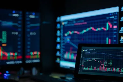volatile bitcoin price chart on monitor with warning checklist notebook, realistic economic newsroom desk, no brand logos